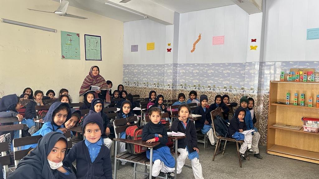Gokina schoolgirls attending class in their village school, 2023